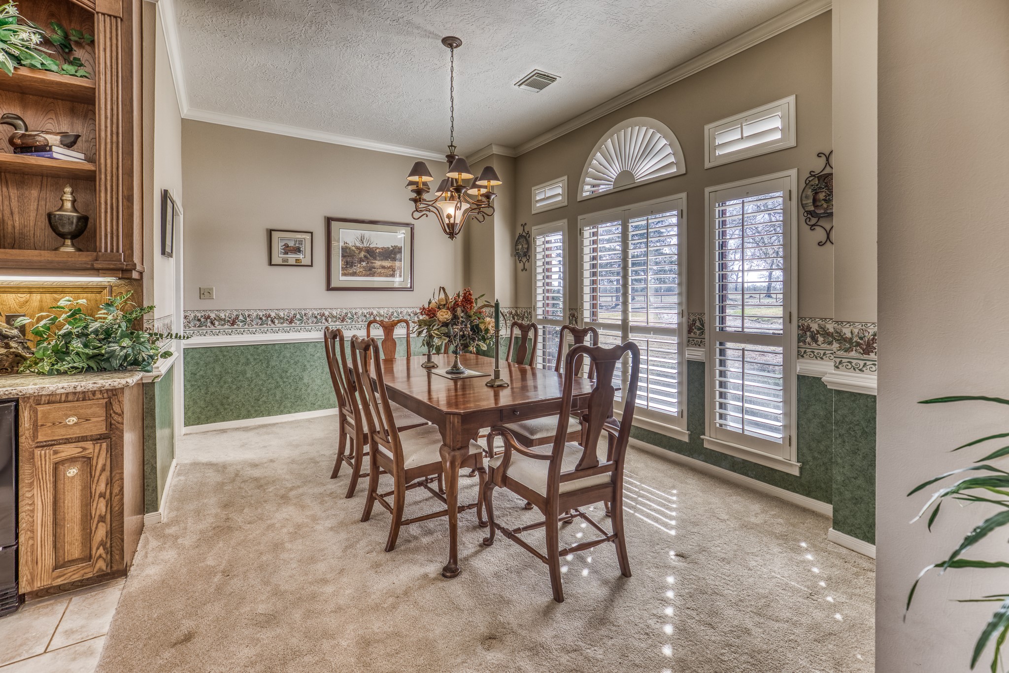 23032 Oak Road New Ulm, TX 78950 - Photo 11 of 44 a view of a dining room with furniture window and wooden floor