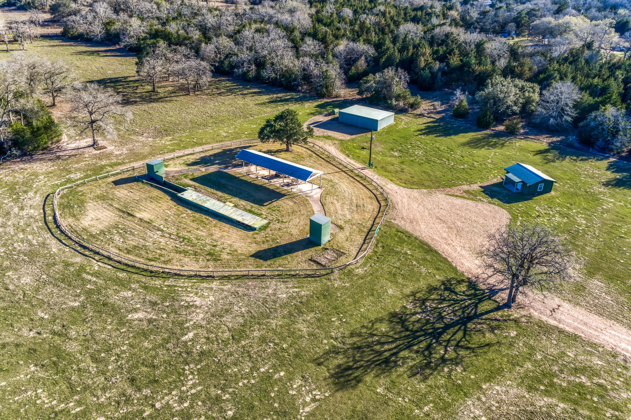 23032 Oak Road New Ulm, TX 78950 - Photo 30 of 44 a view of a swimming pool with a yard