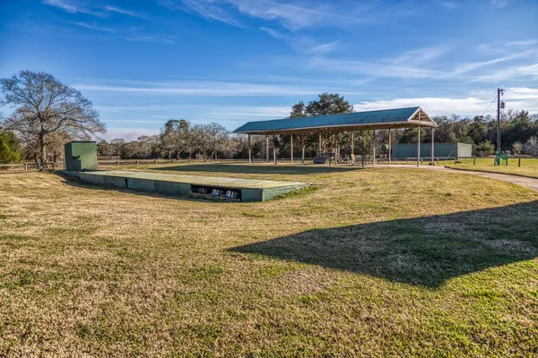a view of a lake with a big yard