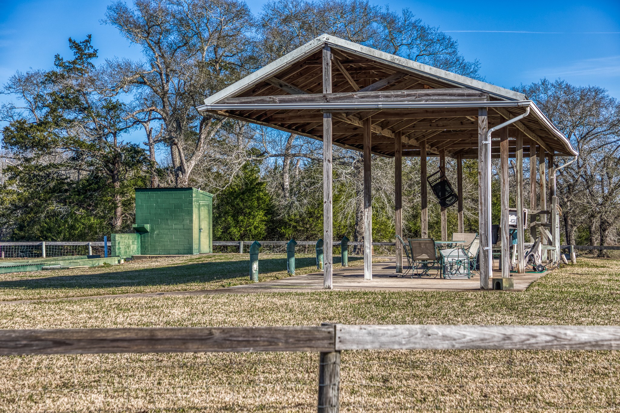 23032 Oak Road New Ulm, TX 78950 - Photo 34 of 44 a backyard of a house with barbeque oven