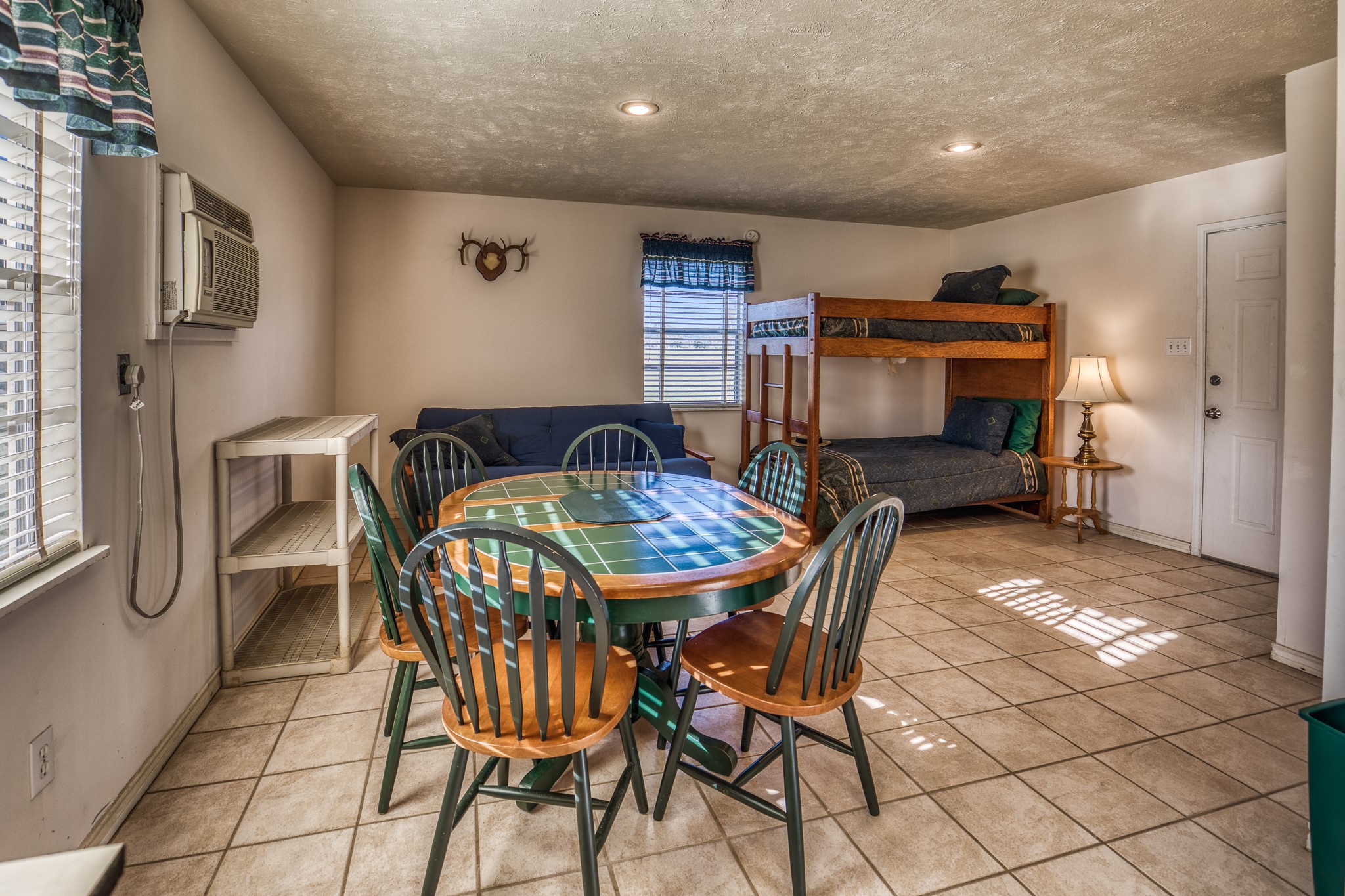 23032 Oak Road New Ulm, TX 78950 - Photo 37 of 44 a dining room with furniture and window