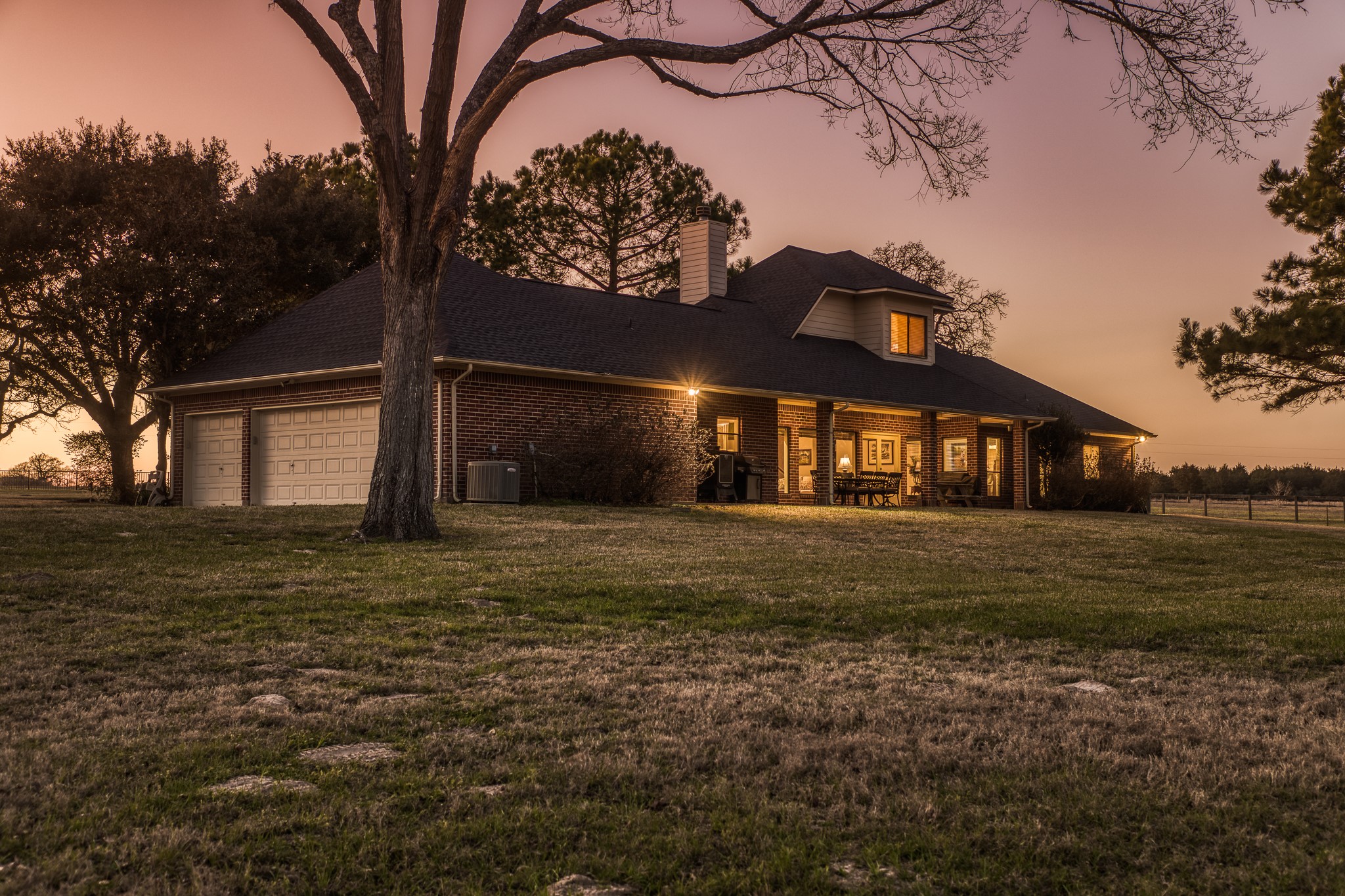 23032 Oak Road New Ulm, TX 78950 - Photo 43 of 44 a front view of a house with a yard