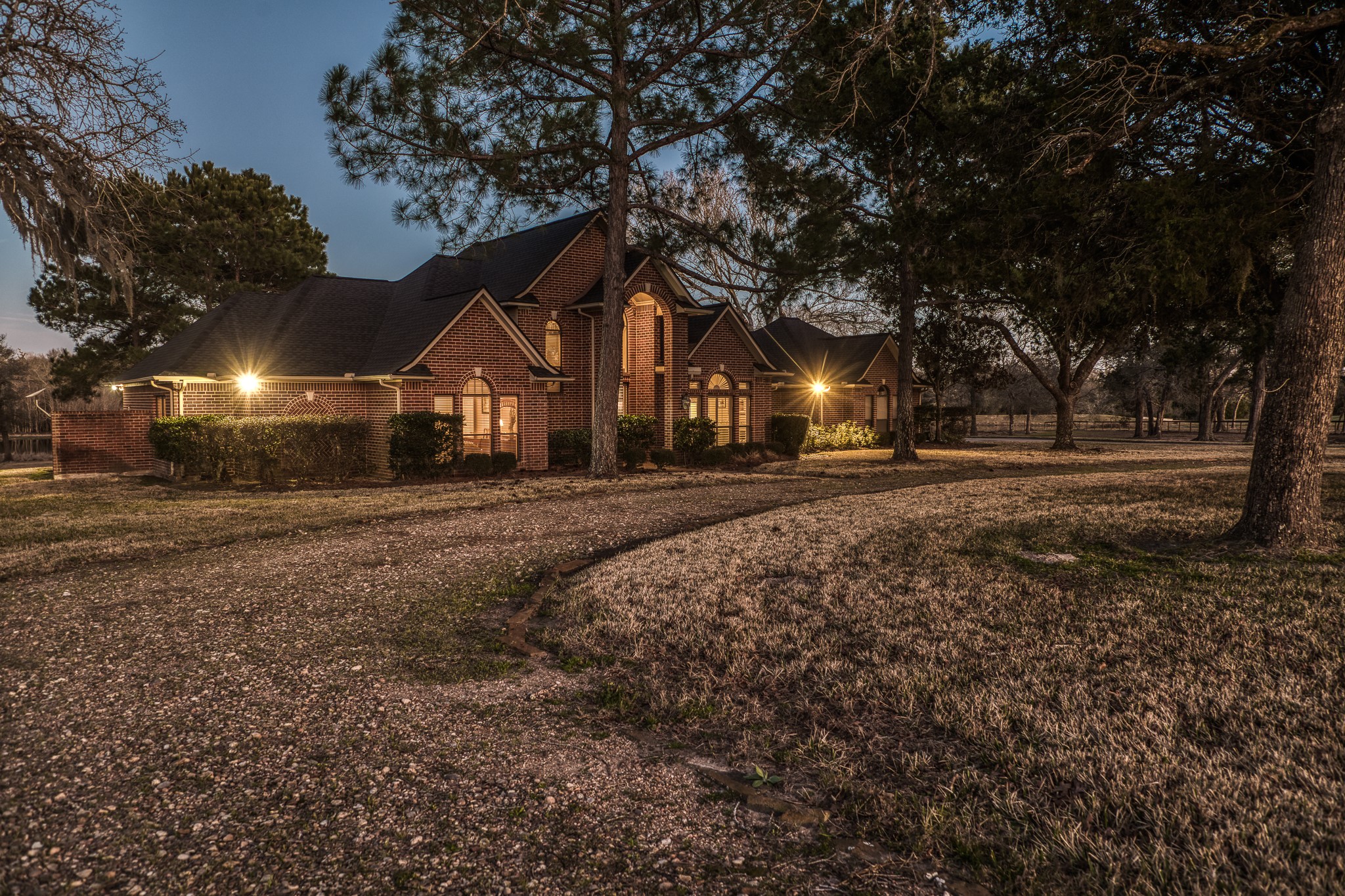 23032 Oak Road New Ulm, TX 78950 - Photo 7 of 44 a front view of a house with a yard