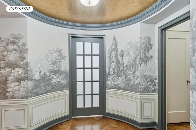 a kitchen with stainless steel appliances a sink a stove and cabinets