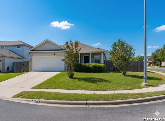 a house view with a garden space