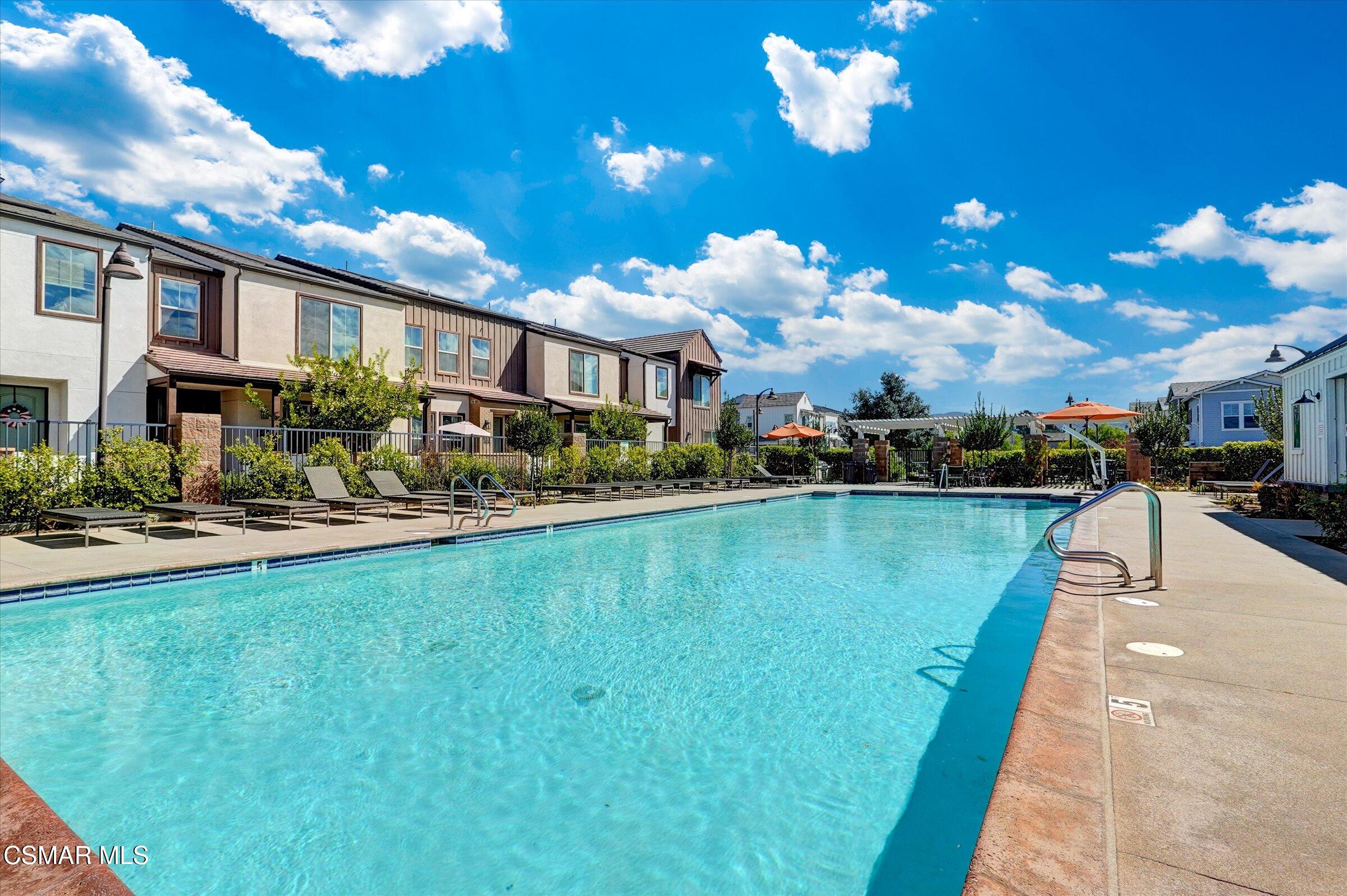 310 Farmhouse Drive, Unit 4 Simi Valley, CA 93065 - Photo 21 of 29 a view of a swimming pool with a patio