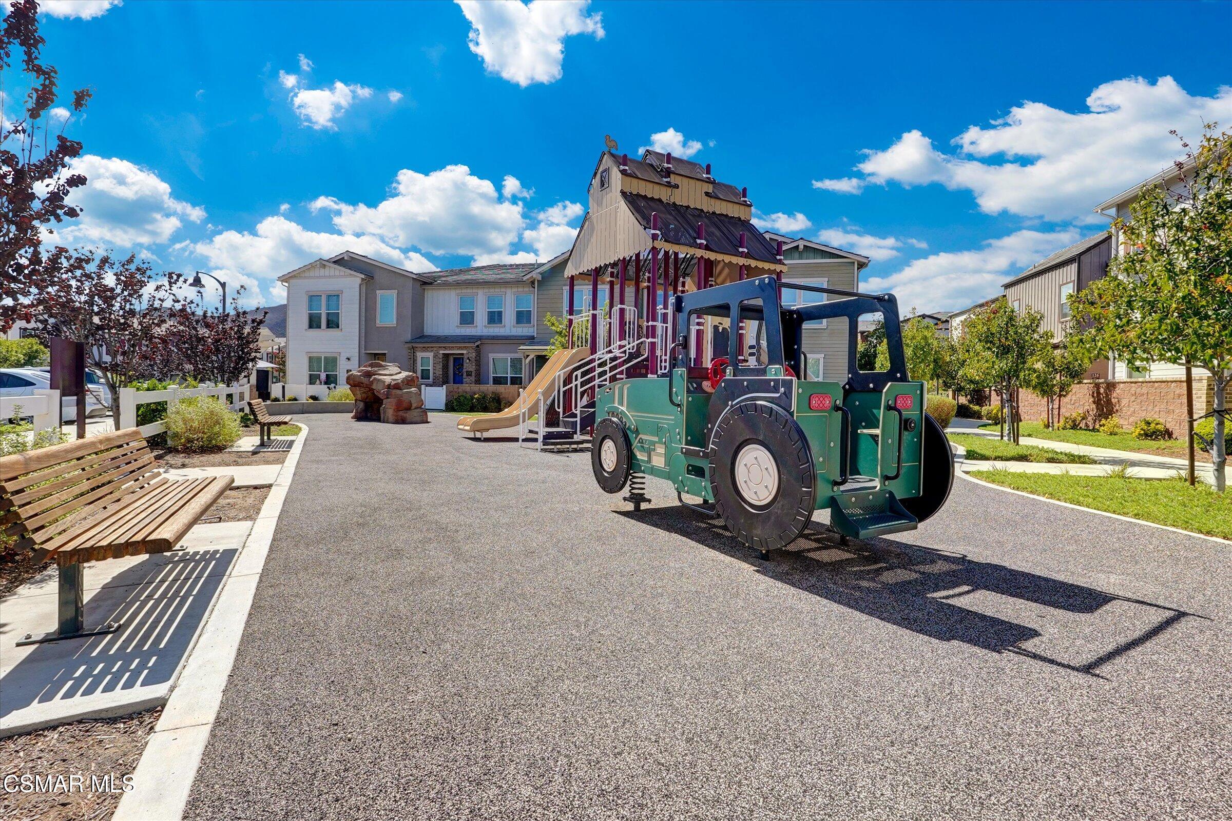 310 Farmhouse Drive, Unit 4 Simi Valley, CA 93065 - Photo 26 of 29 a view of a house with a yard