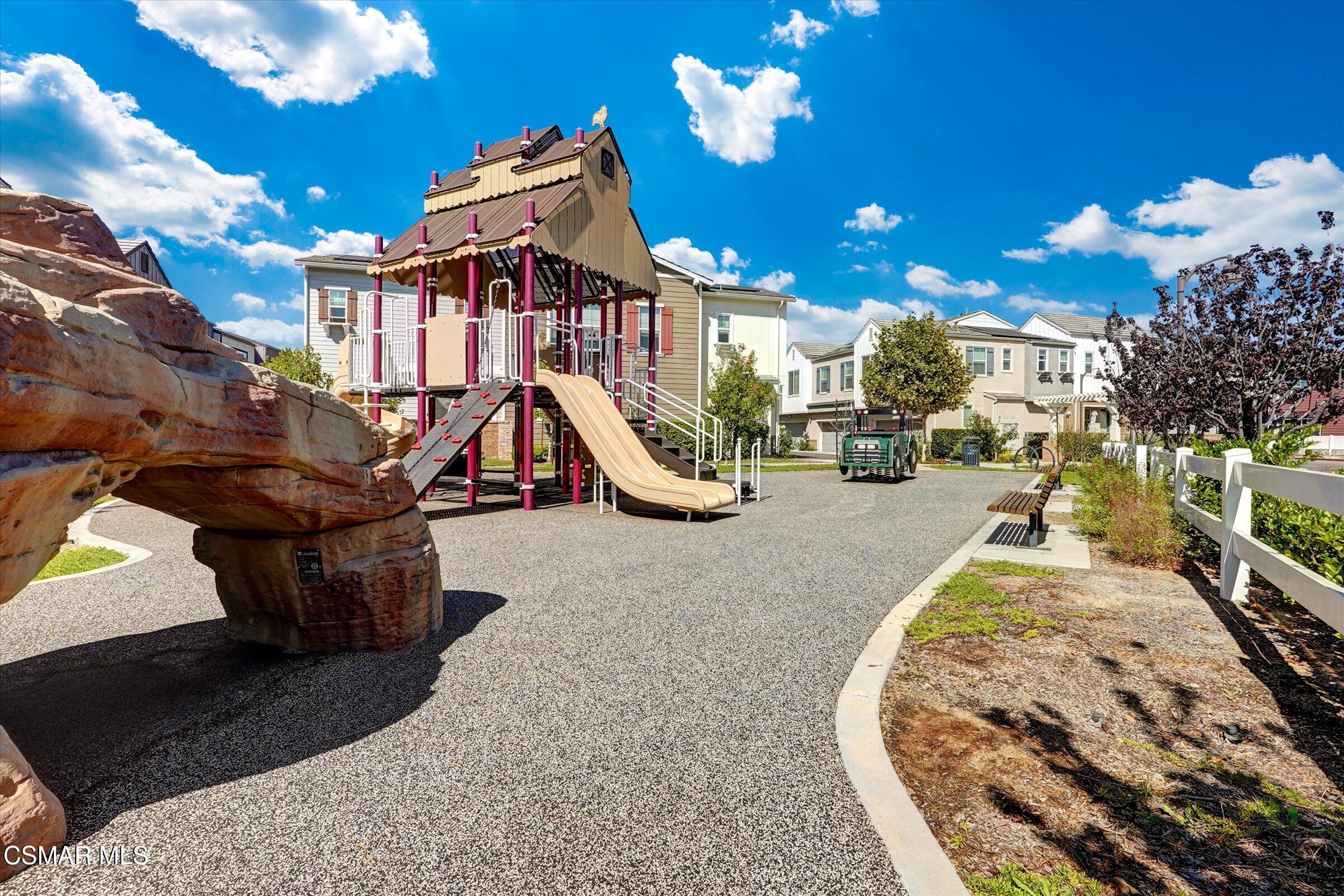310 Farmhouse Drive, Unit 4 Simi Valley, CA 93065 - Photo 27 of 29 a view of a house with a swimming pool