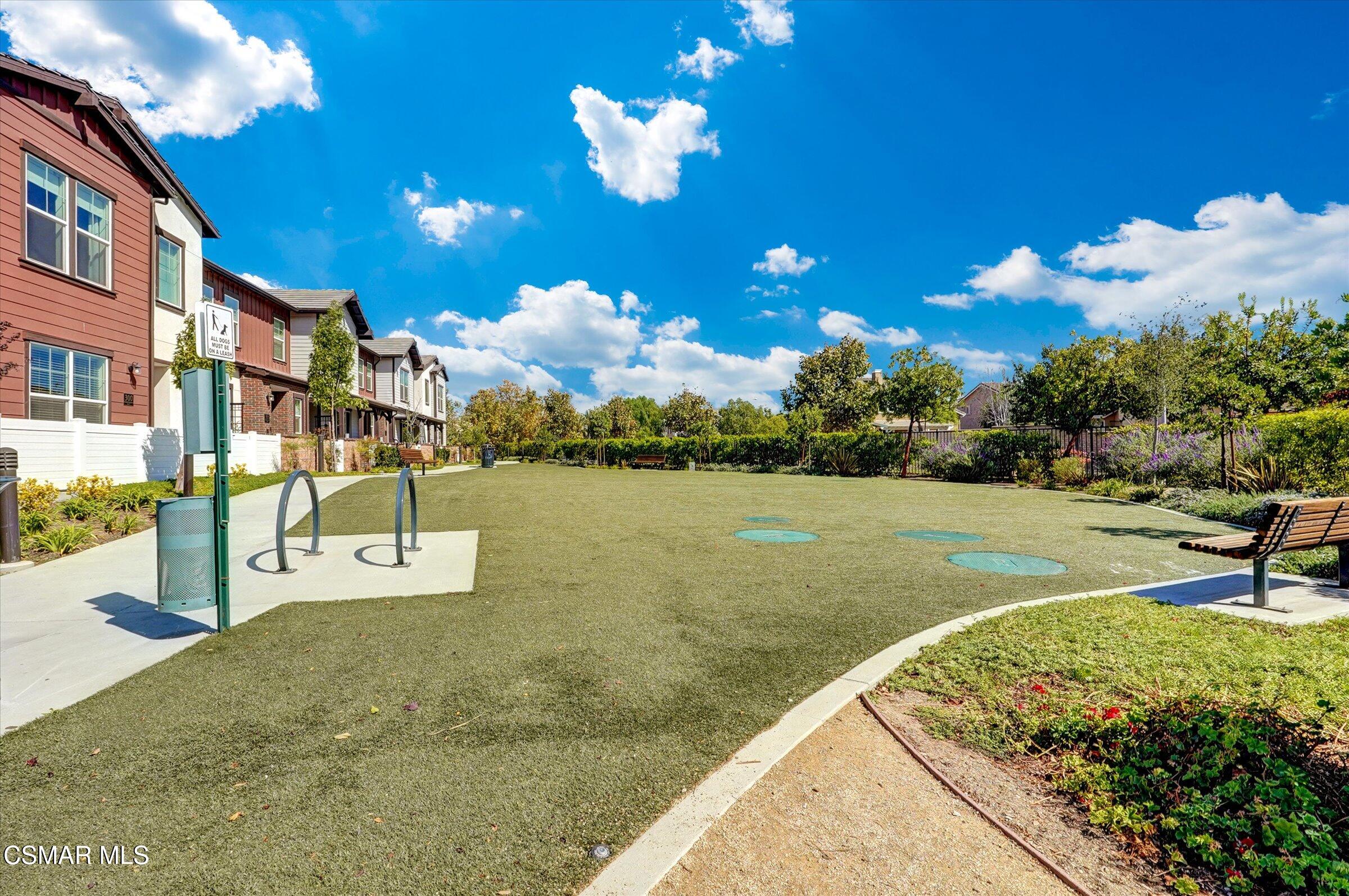 310 Farmhouse Drive, Unit 4 Simi Valley, CA 93065 - Photo 28 of 29 a view of a lake with a yard