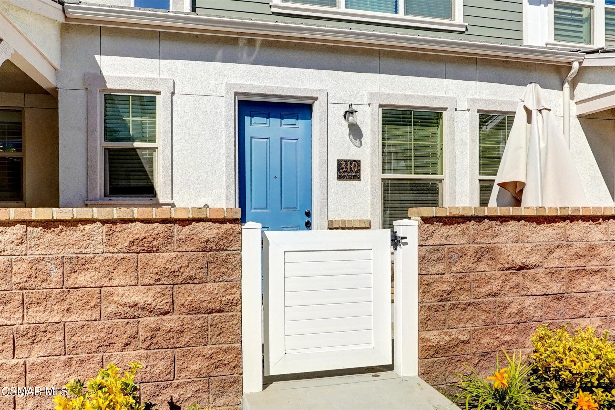 310 Farmhouse Drive, Unit 4 Simi Valley, CA 93065 - Photo 3 of 29 front view of a building