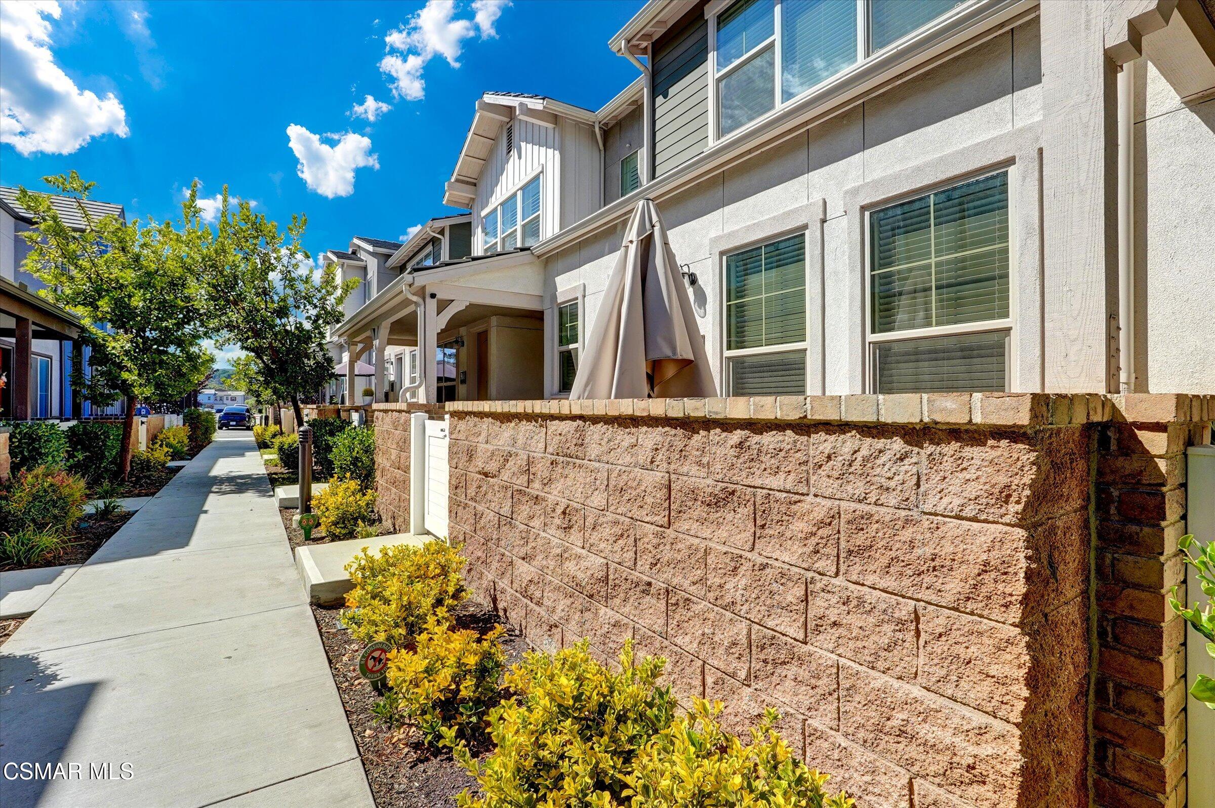 310 Farmhouse Drive, Unit 4 Simi Valley, CA 93065 - Photo 4 of 29 a front view of a house