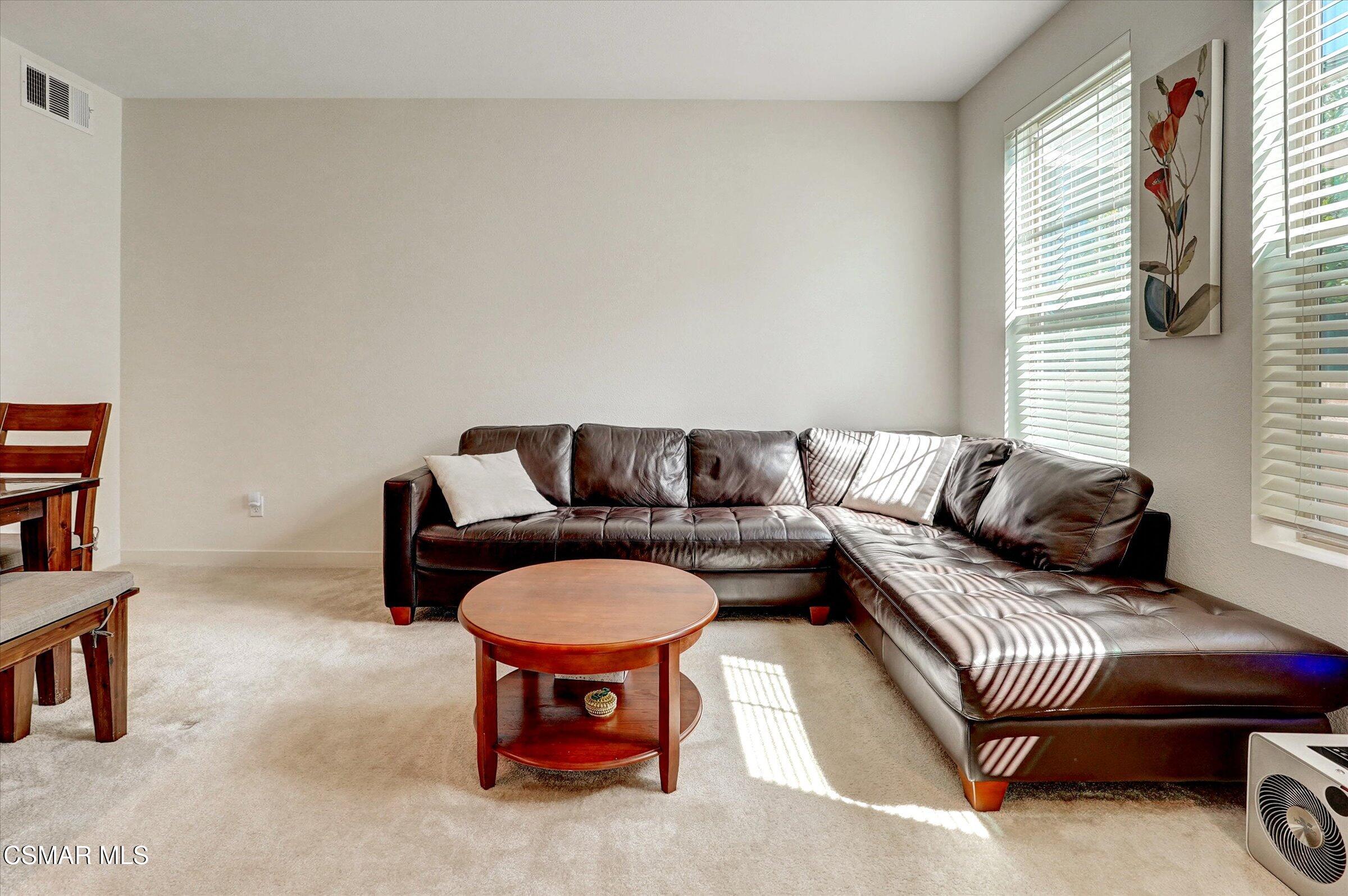 310 Farmhouse Drive, Unit 4 Simi Valley, CA 93065 - Photo 6 of 29 a living room with furniture