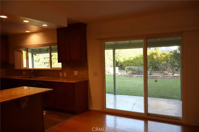 a view of a yard with a tree