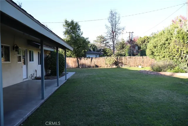 a view of a pathway with a patio
