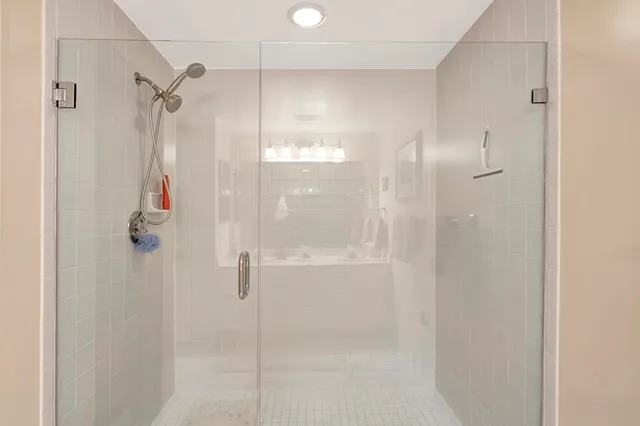 a view of a street with a building in the background