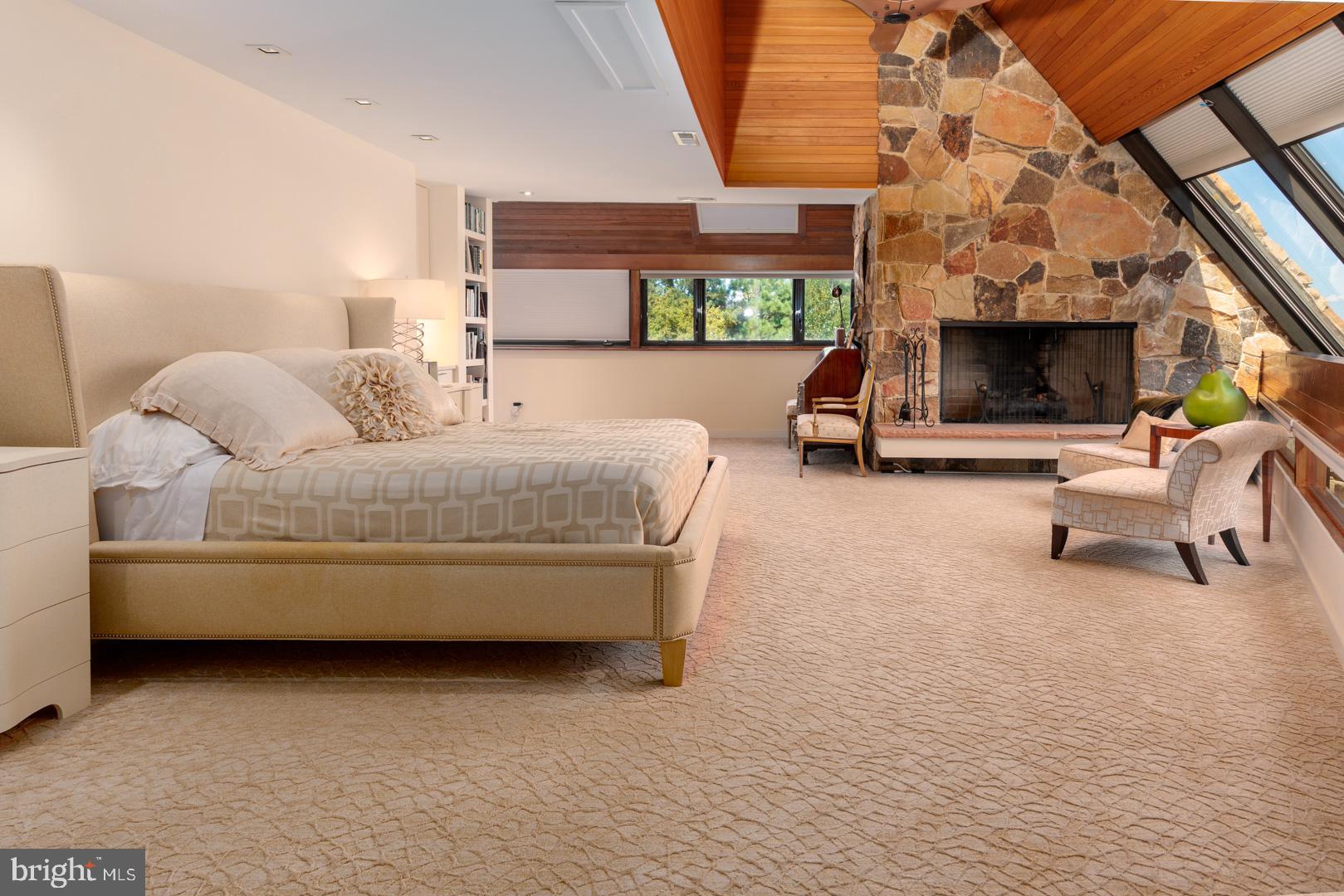 3207 Bennett Point Road Queenstown, MD 21658 - Photo 11 of 69 a living room with furniture and a fireplace