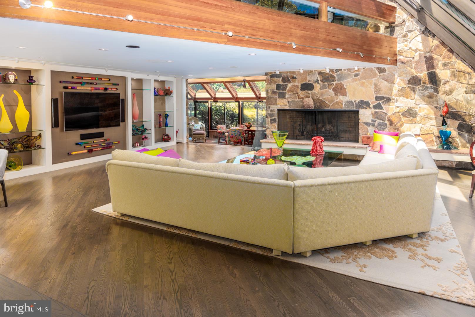3207 Bennett Point Road Queenstown, MD 21658 - Photo 14 of 69 a living room with furniture and a flat screen tv