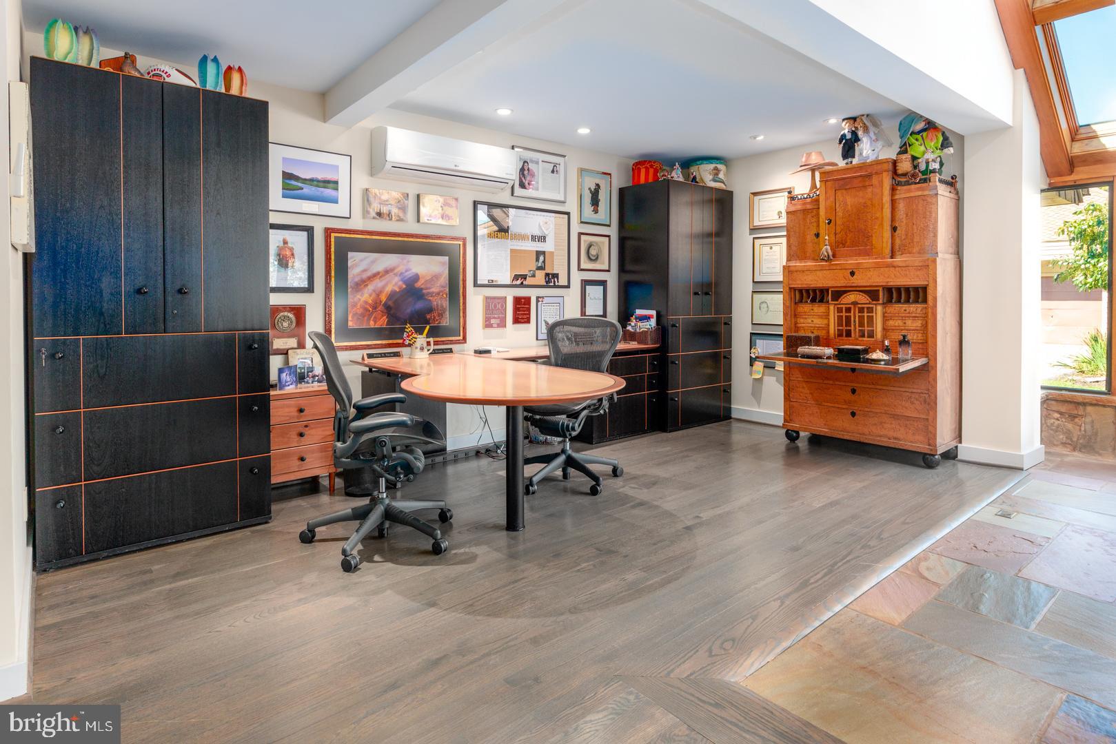 3207 Bennett Point Road Queenstown, MD 21658 - Photo 16 of 69 a view of a workspace with furniture and a window