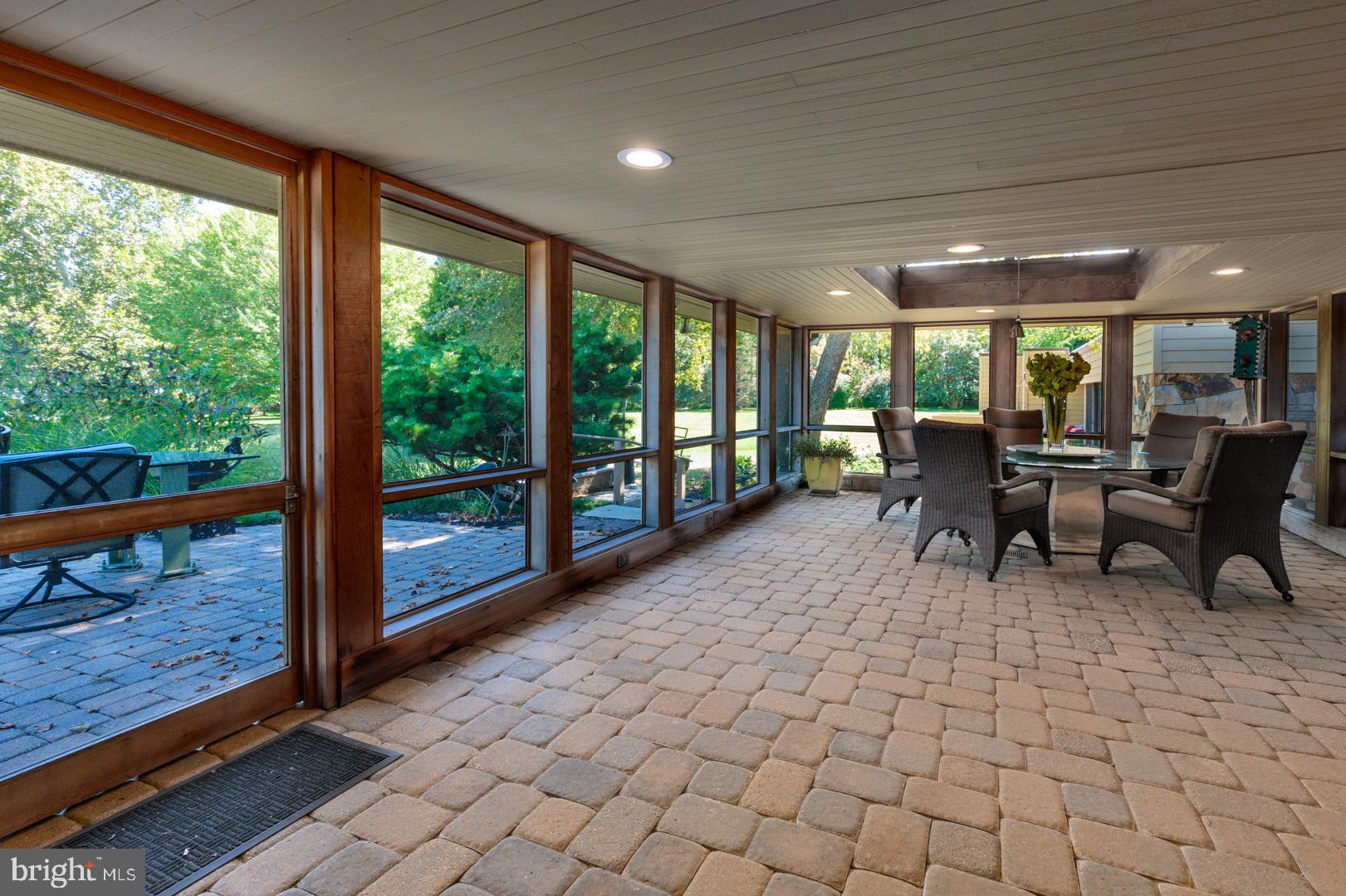 3207 Bennett Point Road Queenstown, MD 21658 - Photo 17 of 69 a view of a dining room with furniture window and outside view