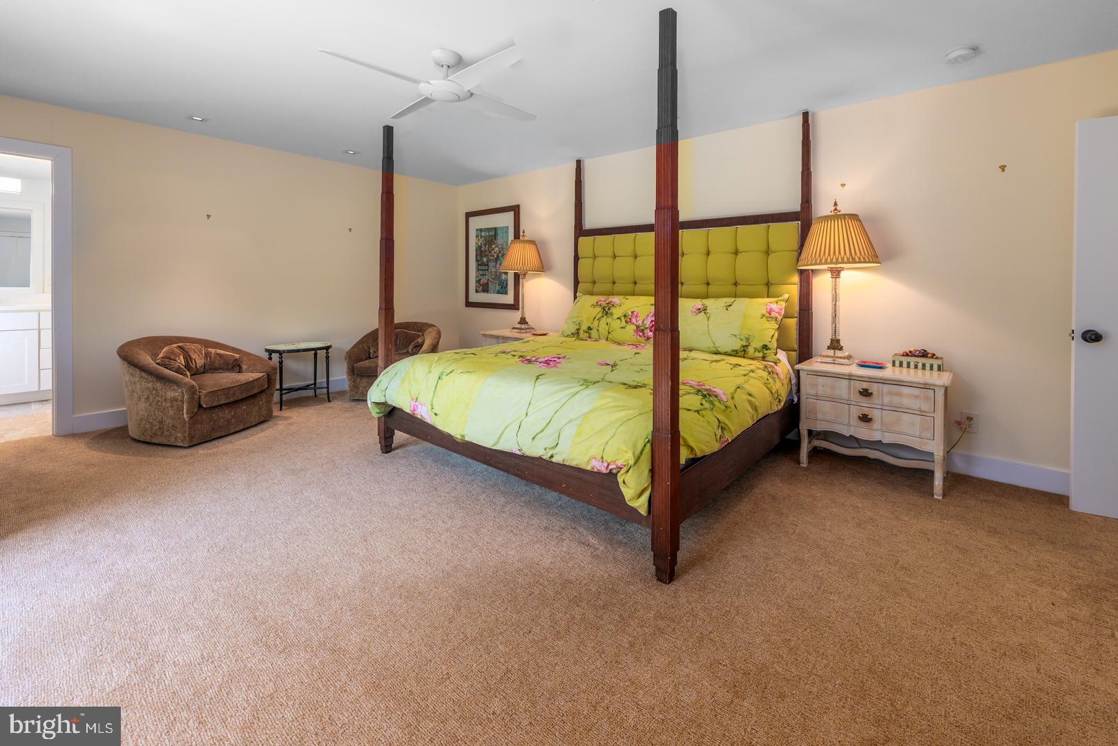 3207 Bennett Point Road Queenstown, MD 21658 - Photo 23 of 69 a bed room with a bed and a night stand