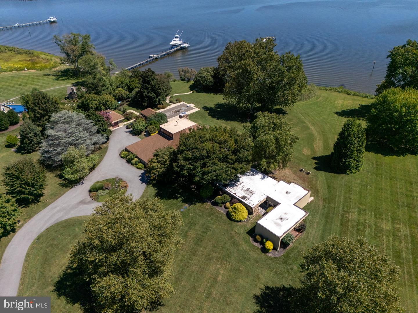 3207 Bennett Point Road Queenstown, MD 21658 - Photo 3 of 69 an aerial view of a house with outdoor space and street view