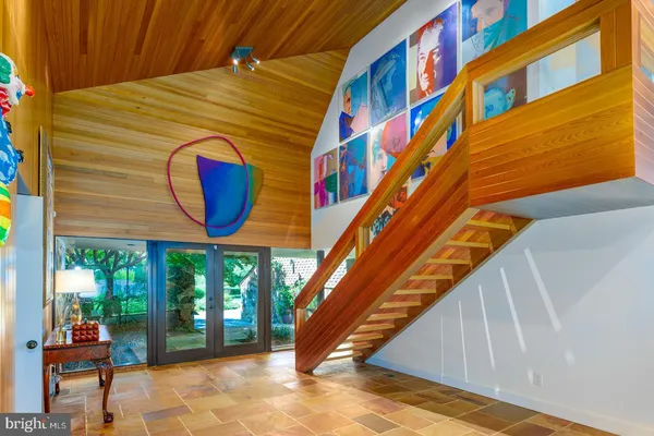 a aerial view of a house with a yard