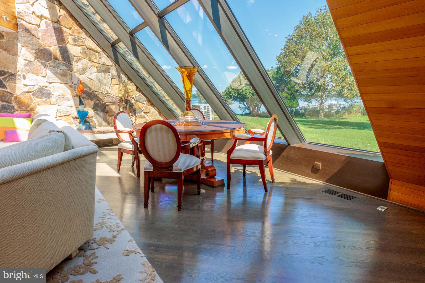 3207 Bennett Point Road Queenstown, MD 21658 - Photo 50 of 69 an outdoor living room with furniture and a window