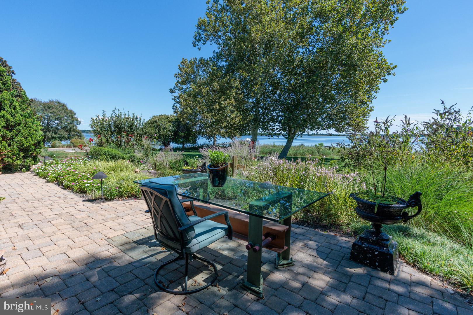 3207 Bennett Point Road Queenstown, MD 21658 - Photo 51 of 69 a view of a bench in a garden