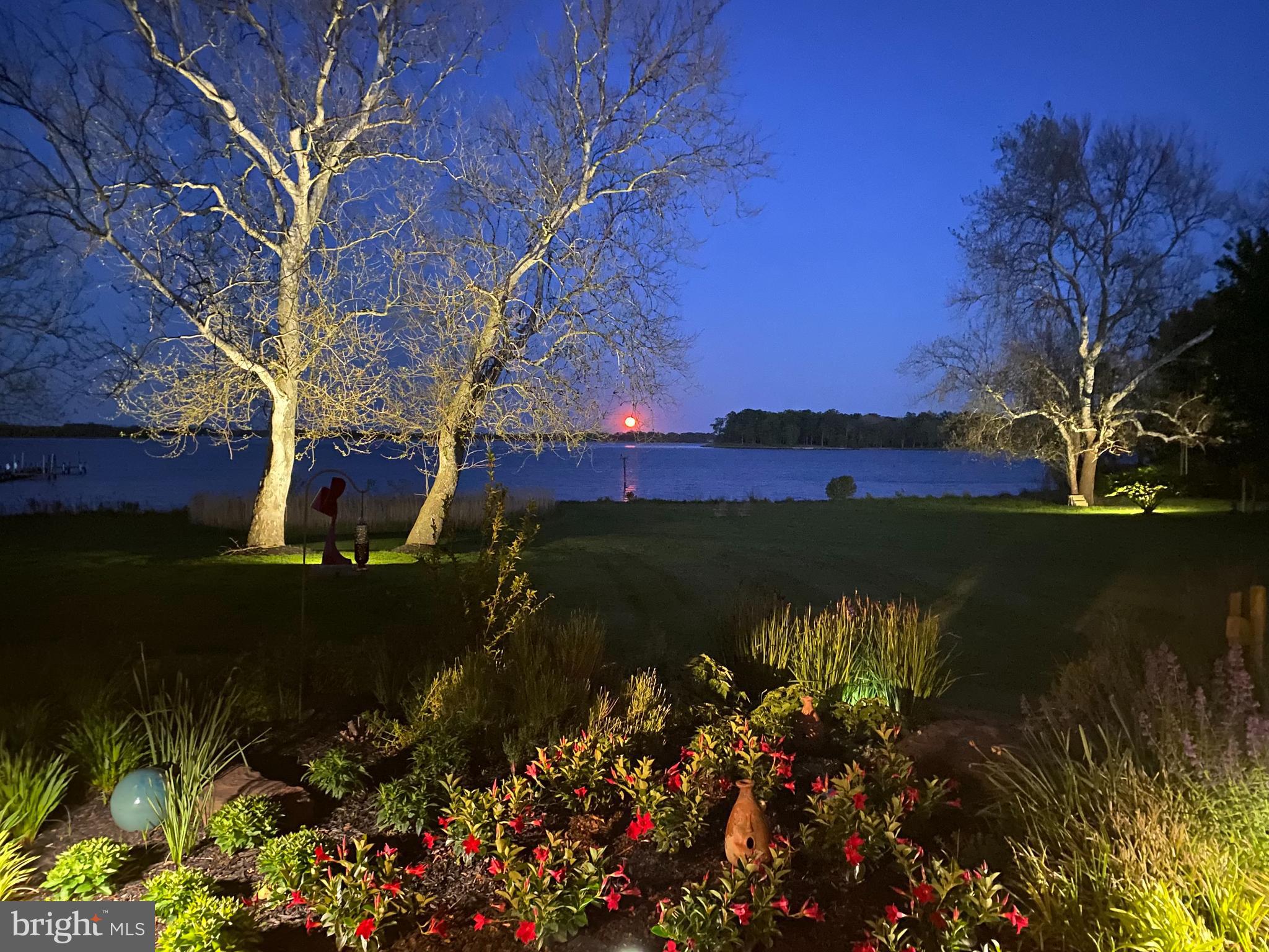 3207 Bennett Point Road Queenstown, MD 21658 - Photo 67 of 69 a view of a lake with a house in background