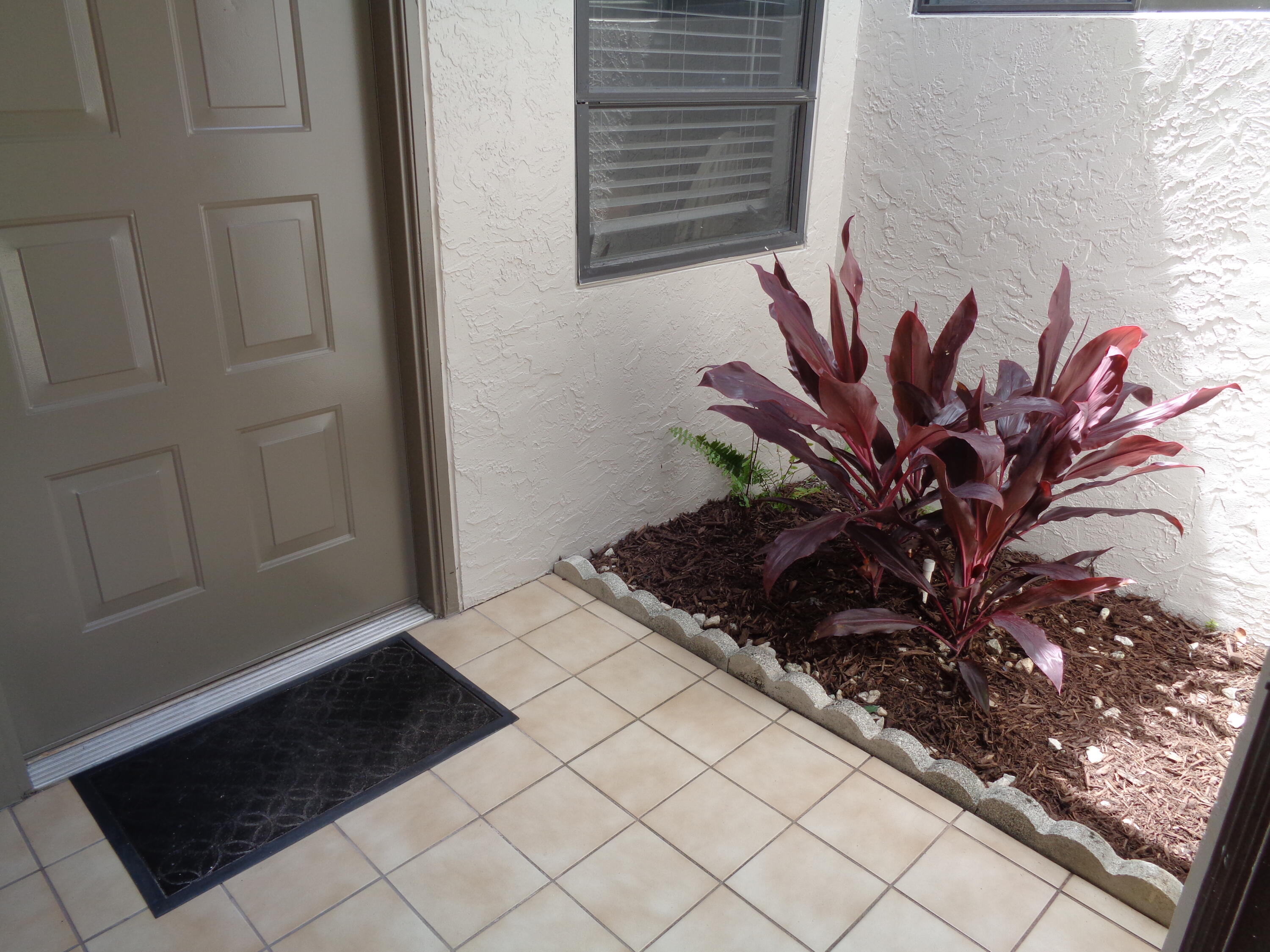 8120 Windgate Drive Boca Raton, FL 33496 - Photo 22 of 28 8120 Windgate Screened Entry
