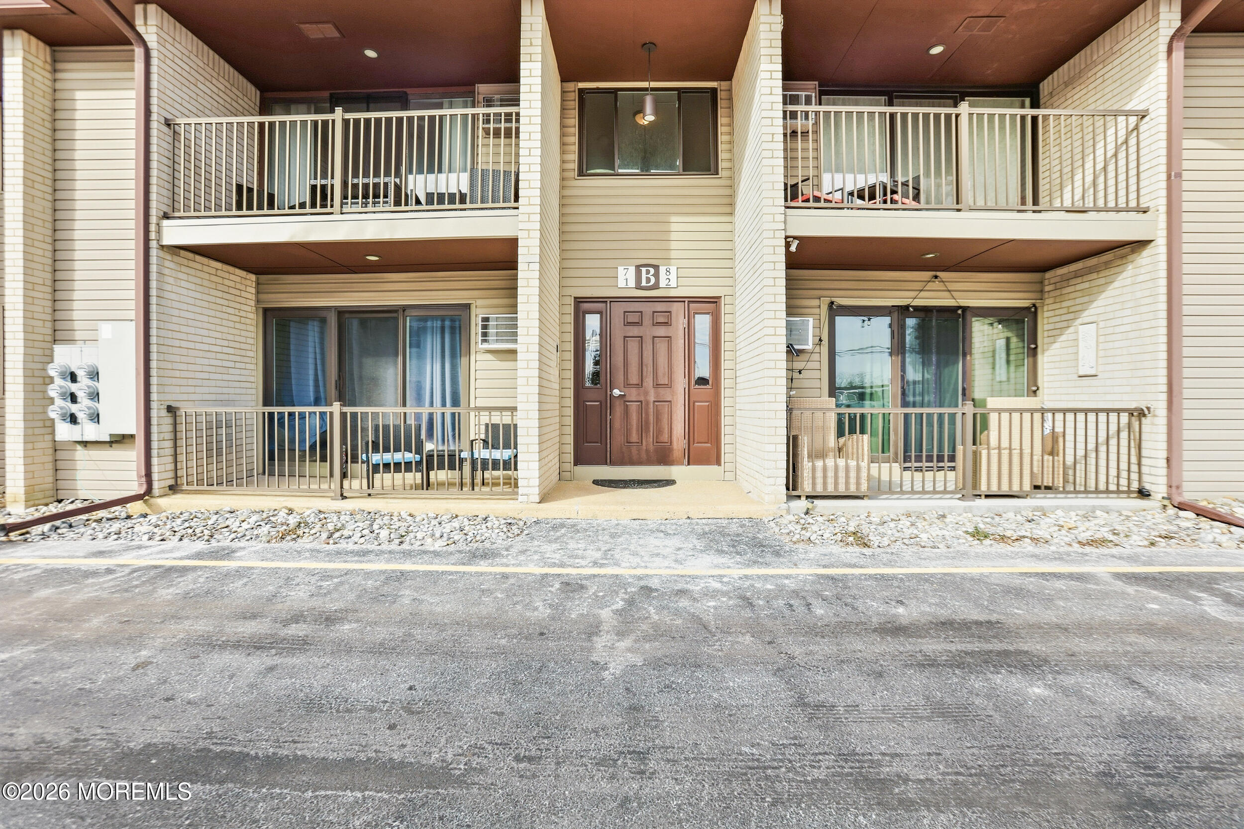 330 Shore Drive, Unit B7 Highlands, NJ 07732 - Photo 8 of 22 a view of a house with a outdoor space