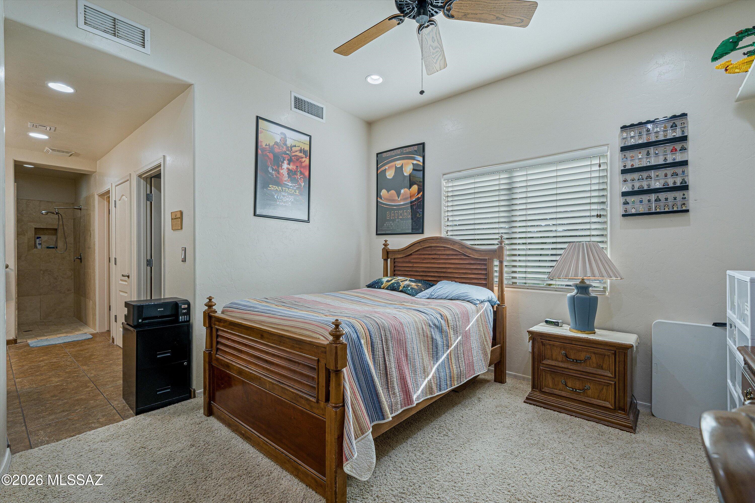4677 East Rail N Road Tucson, AZ 85739 - Photo 28 of 48 En-suite #2 with walk in tiled shower and walk in closet