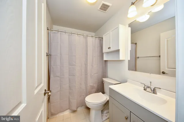 a view of a hallway with staircase