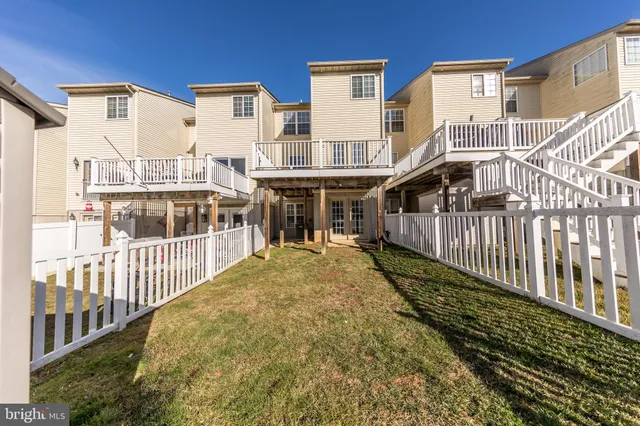 a view of a swimming pool and an outdoor seating