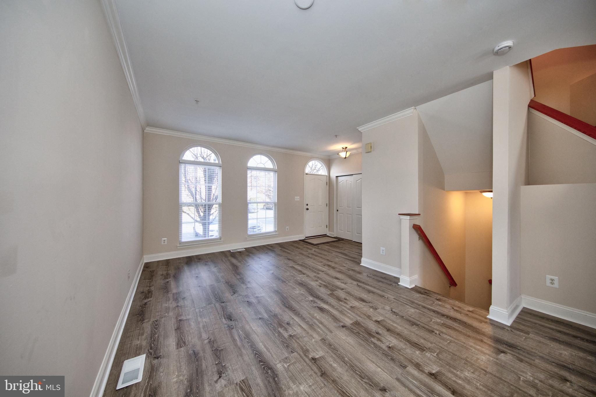 580 Callander Way Abingdon, MD 21009 - Photo 3 of 31 a view of empty room with wooden floor and fan