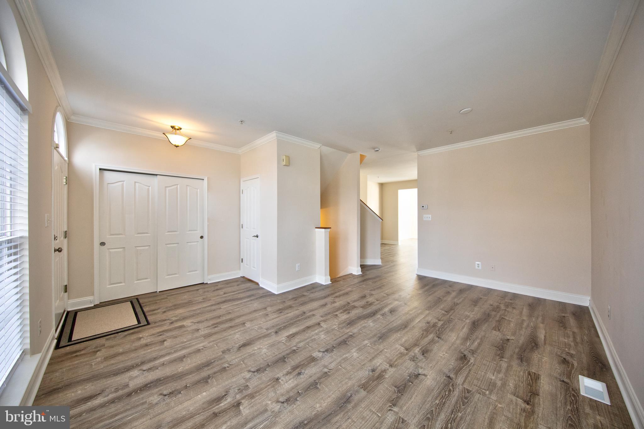 580 Callander Way Abingdon, MD 21009 - Photo 4 of 31 a view of an empty room with wooden floor