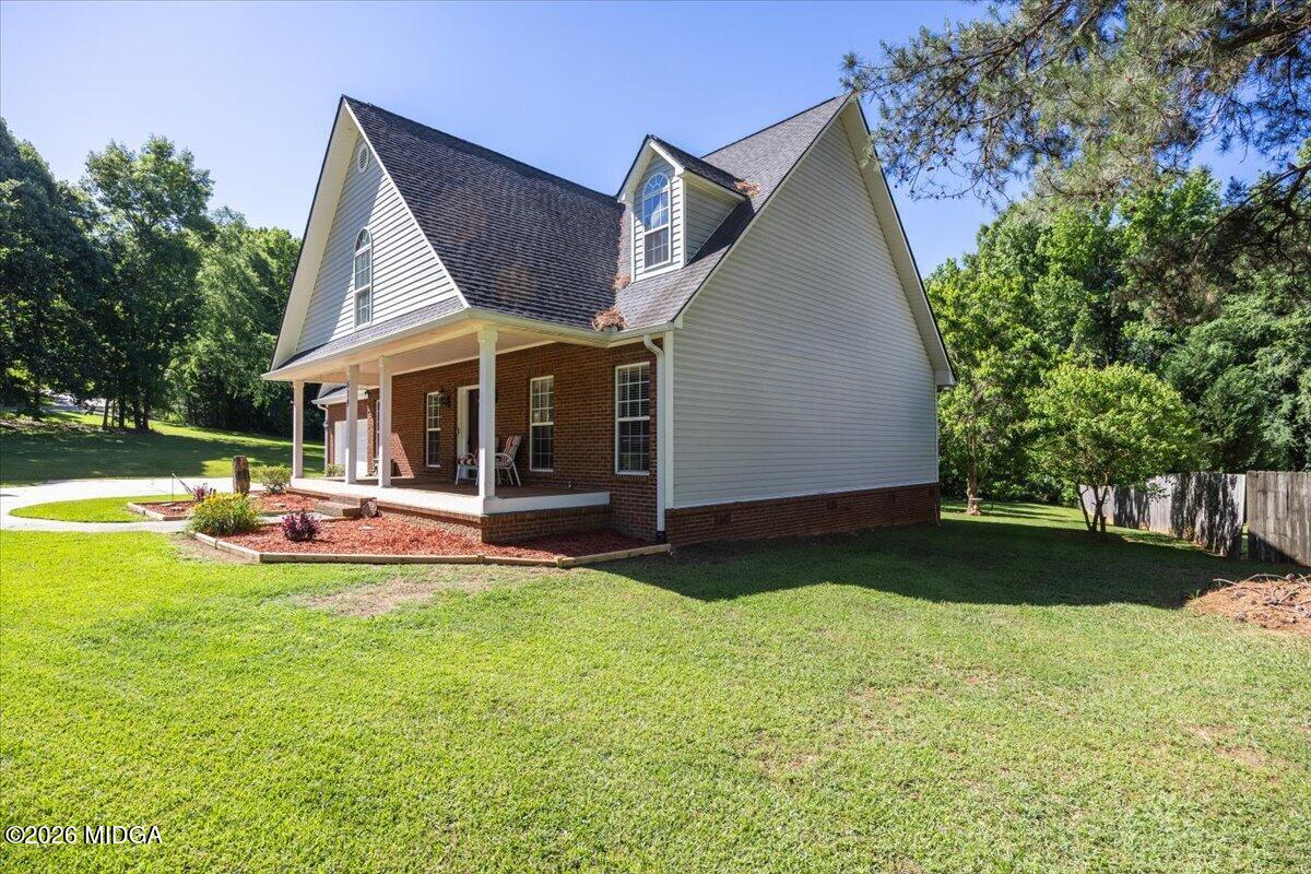 619 Grayridge Road Gray, GA 31032 - Photo 40 of 40 a view of a house with a yard patio and swimming pool