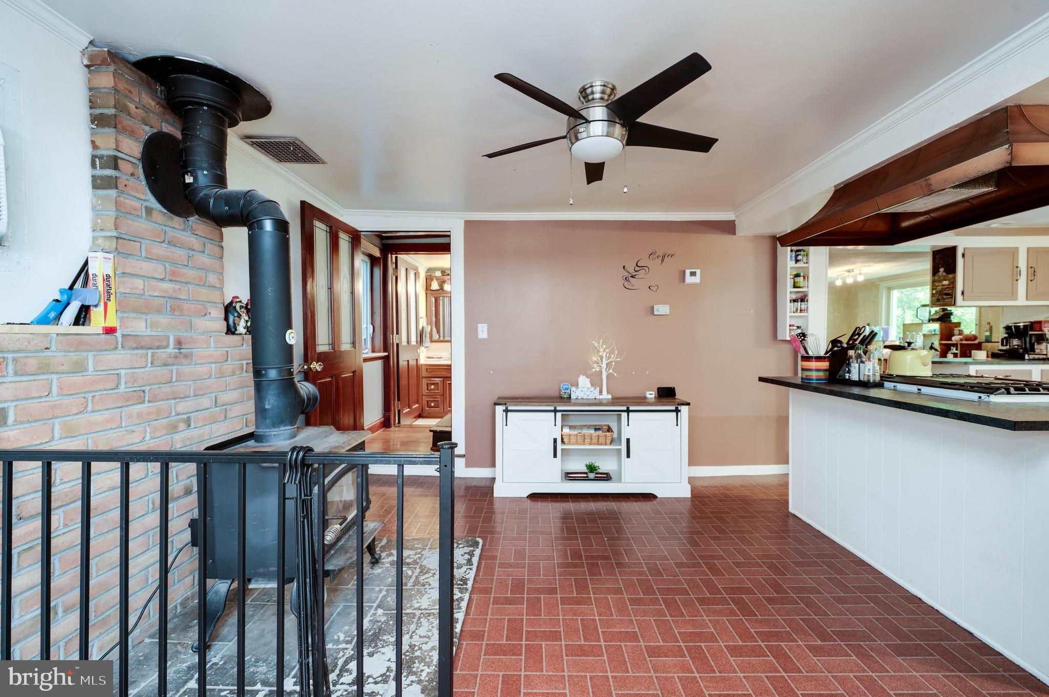 568 North Church Road Reading, PA 19607 - Photo 11 of 56 a view of kitchen and living room with wooden floor