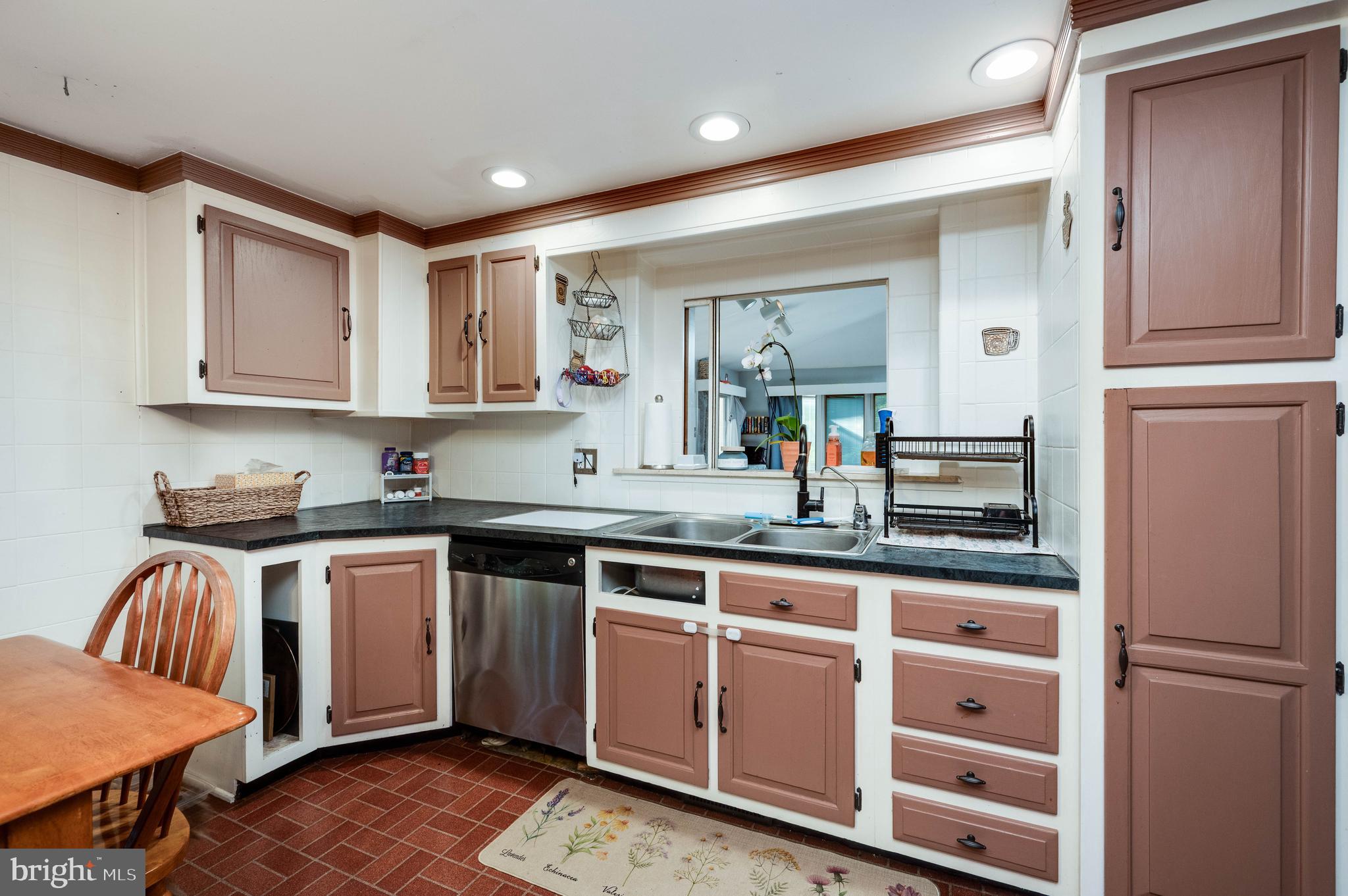 568 North Church Road Reading, PA 19607 - Photo 17 of 56 a kitchen with granite countertop stainless steel appliances a sink and cabinets
