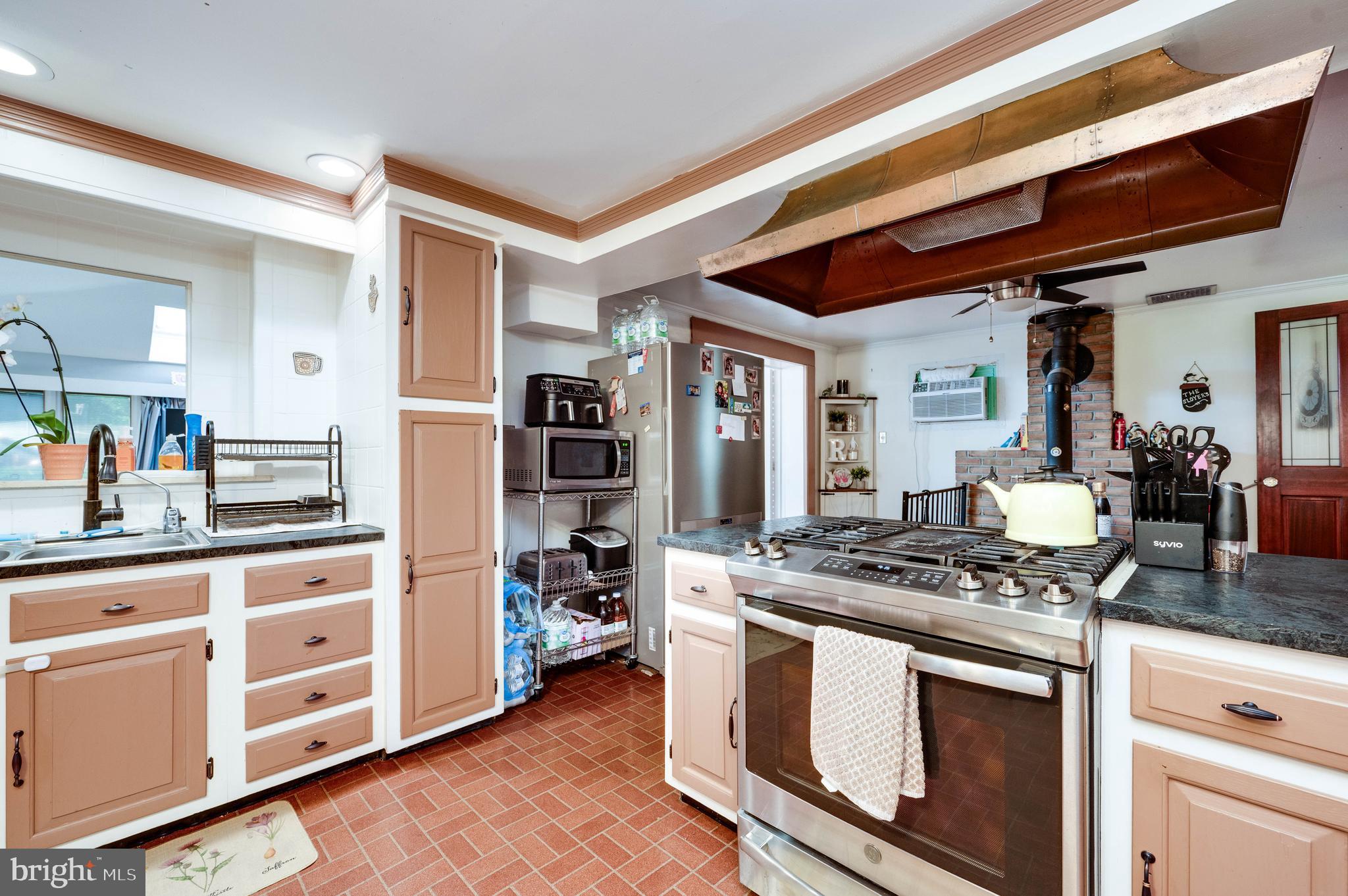 568 North Church Road Reading, PA 19607 - Photo 18 of 56 a kitchen with stainless steel appliances granite countertop a stove and a cabinets