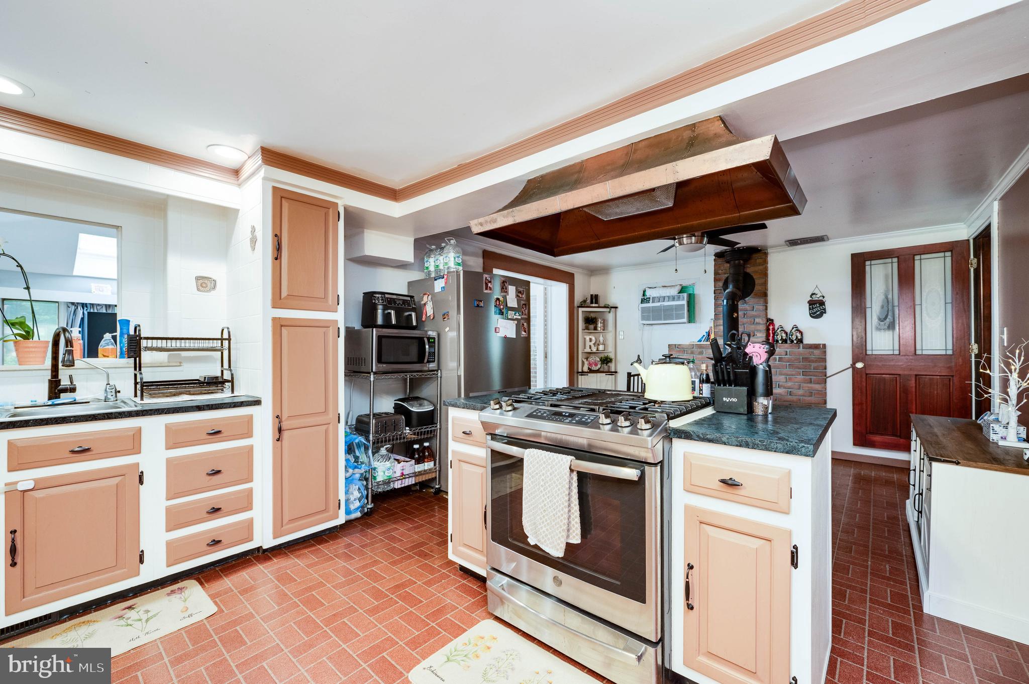 568 North Church Road Reading, PA 19607 - Photo 19 of 56 a kitchen with stainless steel appliances granite countertop a stove and a sink