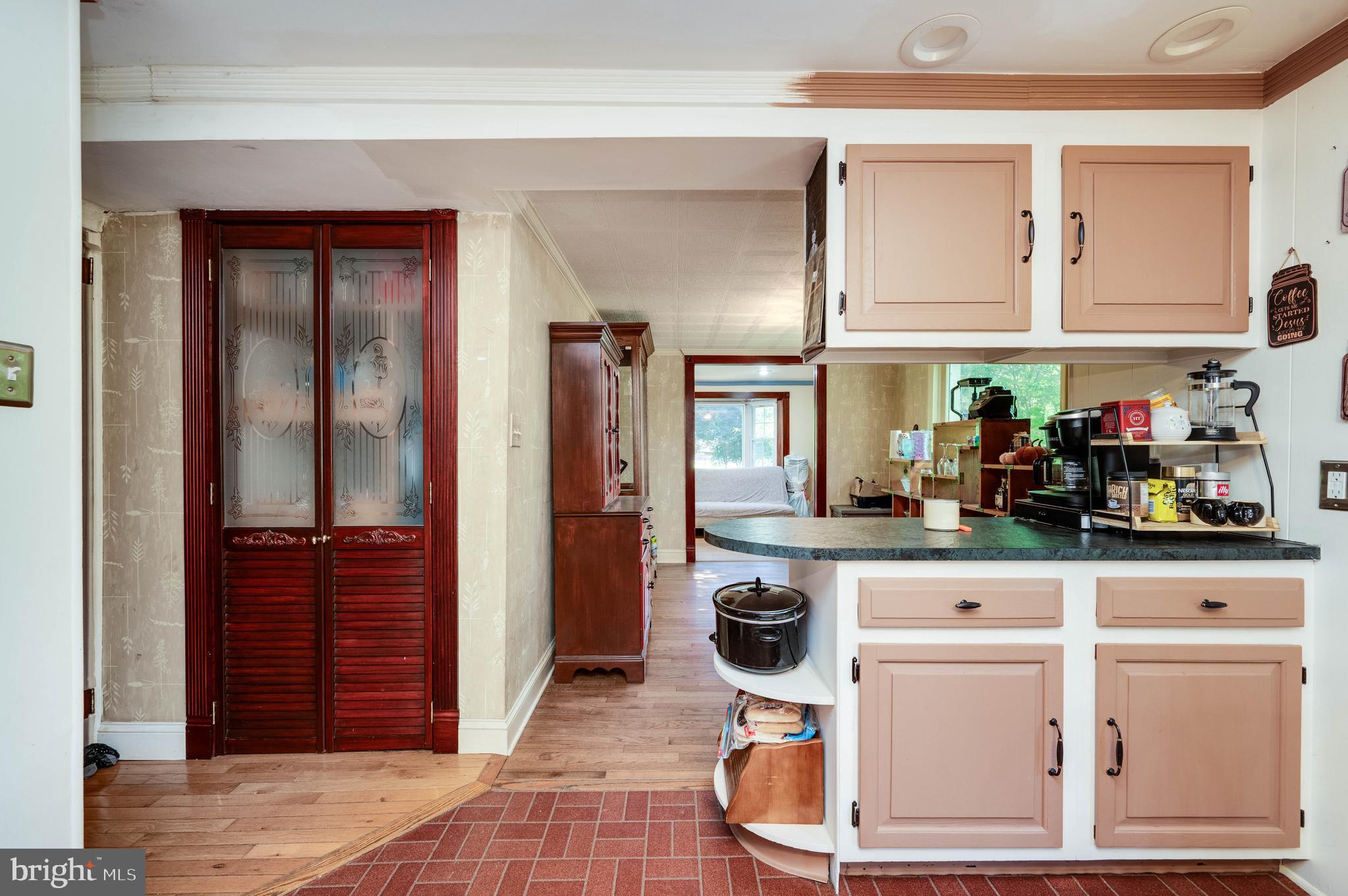 568 North Church Road Reading, PA 19607 - Photo 21 of 56 a kitchen with a refrigerator and cabinets