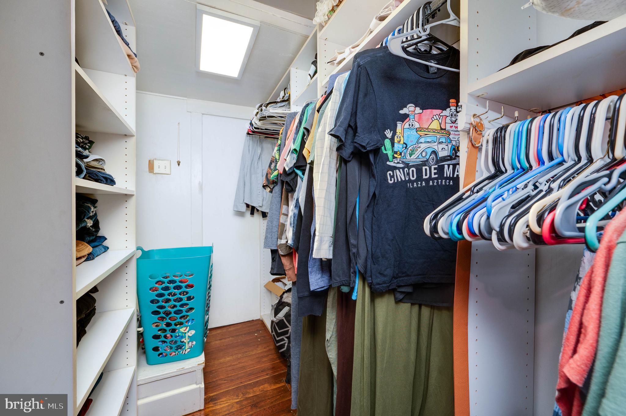 568 North Church Road Reading, PA 19607 - Photo 35 of 56 a view of walk in closet with clothes and shoes