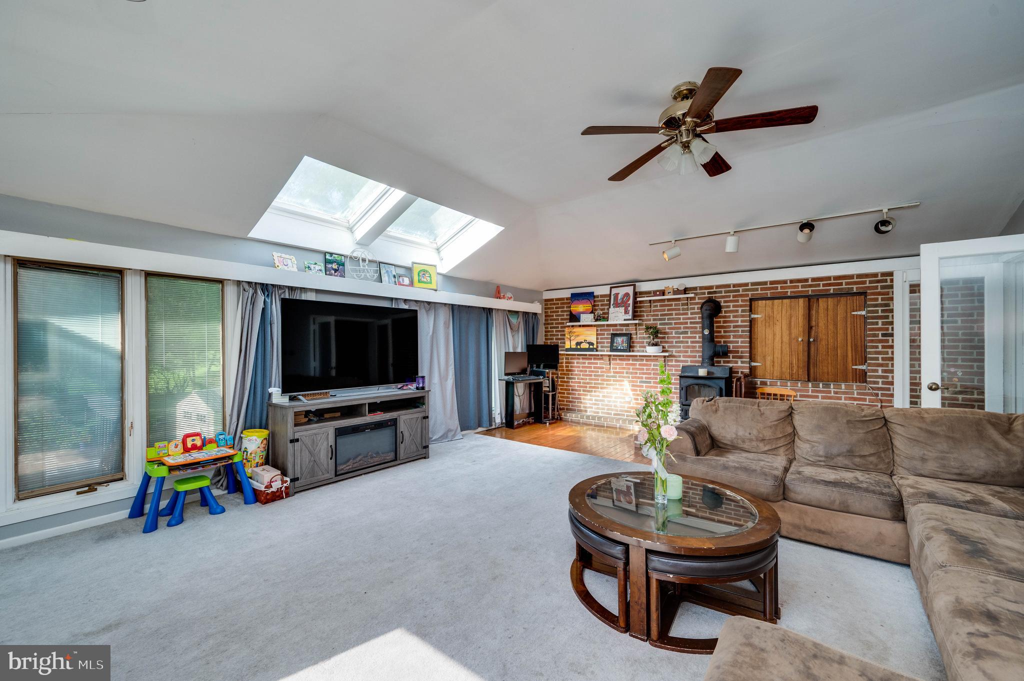 568 North Church Road Reading, PA 19607 - Photo 6 of 56 a living room with furniture and a flat screen tv