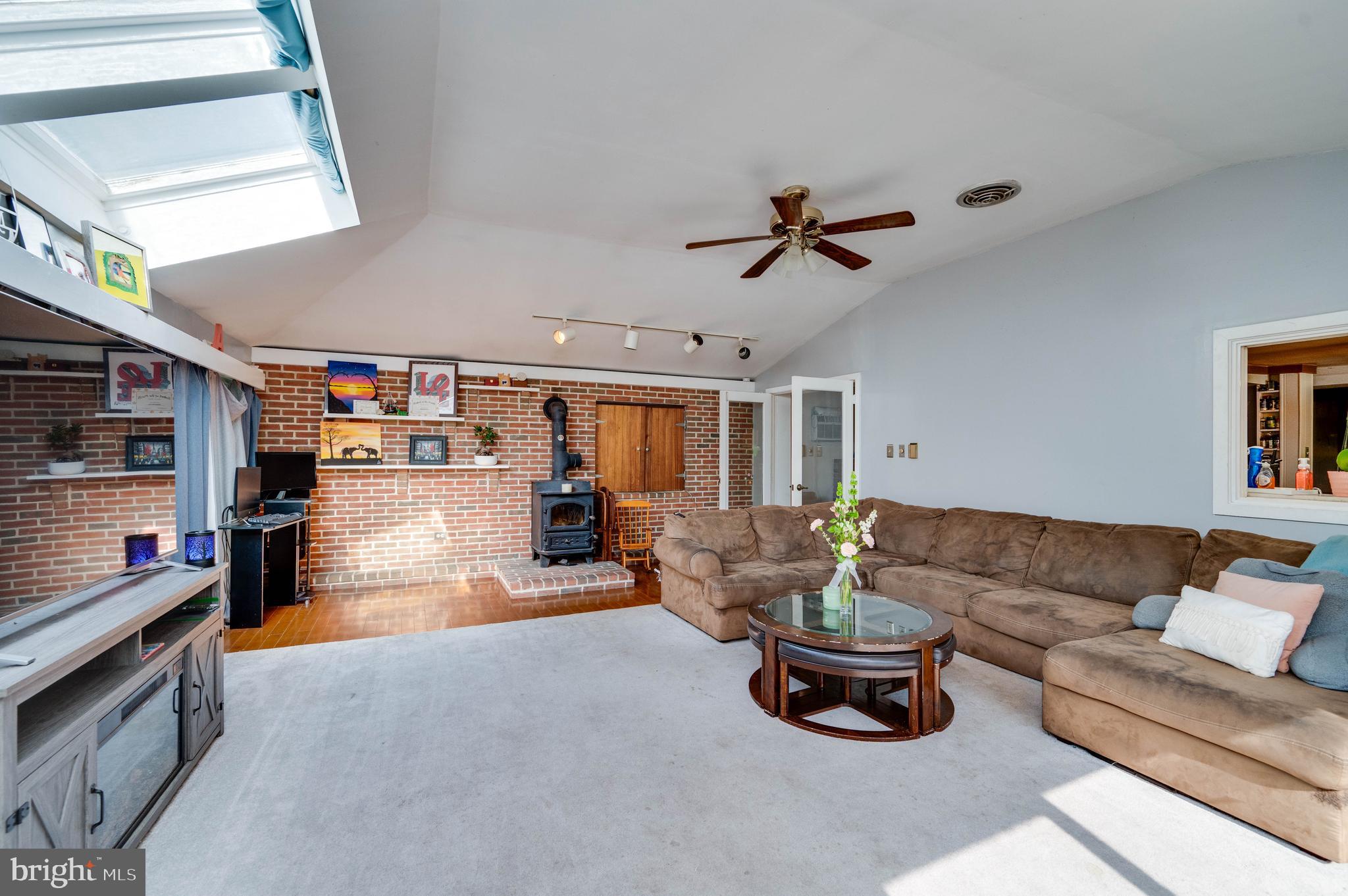 568 North Church Road Reading, PA 19607 - Photo 8 of 56 a living room with furniture and a chandelier