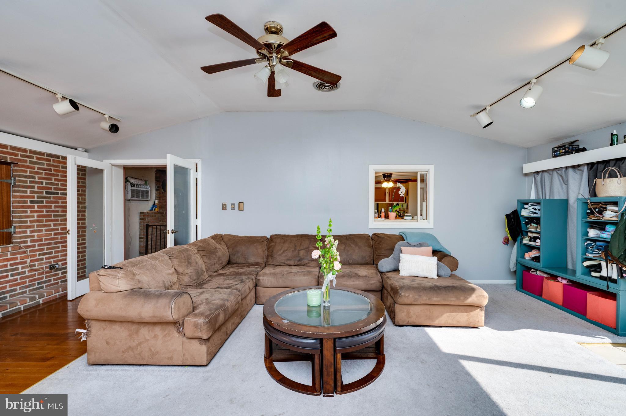 568 North Church Road Reading, PA 19607 - Photo 10 of 56 a living room with furniture and a flat screen tv