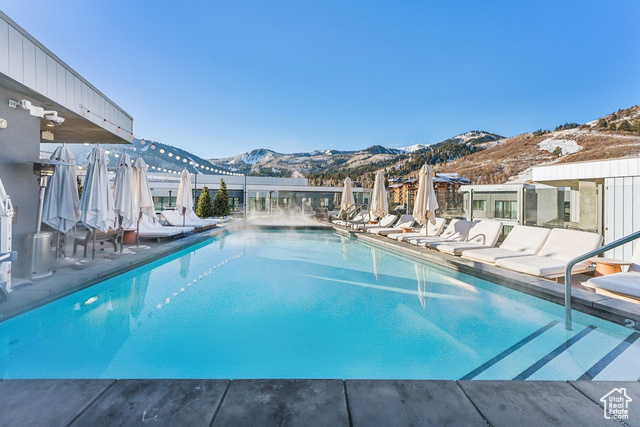 2417 West High Mountain Road, Unit 2202 Park City, UT 84098 - Photo 26 of 28 View of pool with a patio and a mountain view