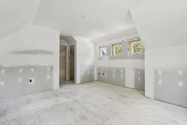 a view of a lounge chair in the room