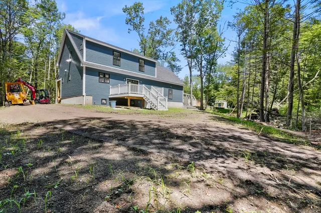 a kitchen with stainless steel appliances a refrigerator stove microwave and sink