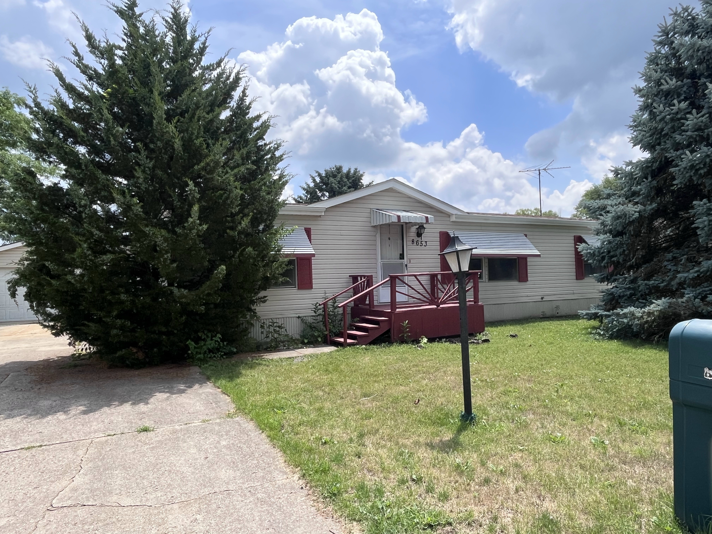 8653 Fig Tree Lane Roscoe, IL 61073 - Photo 1 of 22 a view of a house with a yard and furniture
